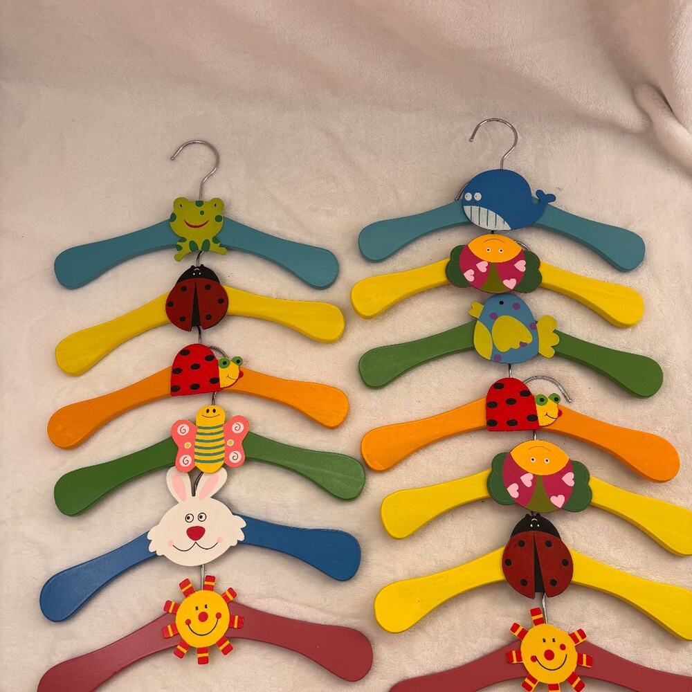 Set of 13 Children's Wooden Clothes Hangers – Cartoon Animal Design.